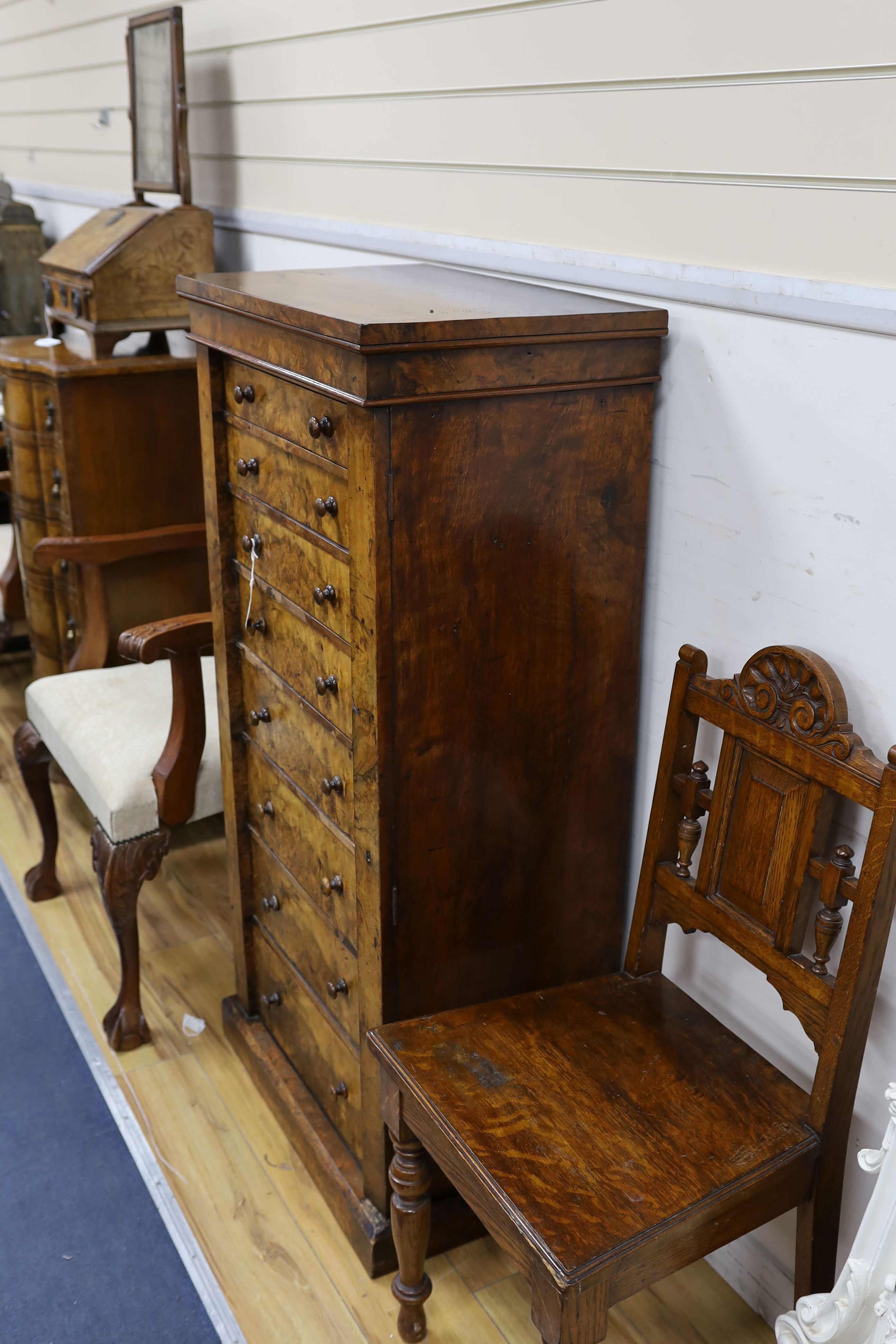A Victorian figured walnut eight drawer Wellington chest with single locking bar, width 61cm, depth 40cm, height 128cm